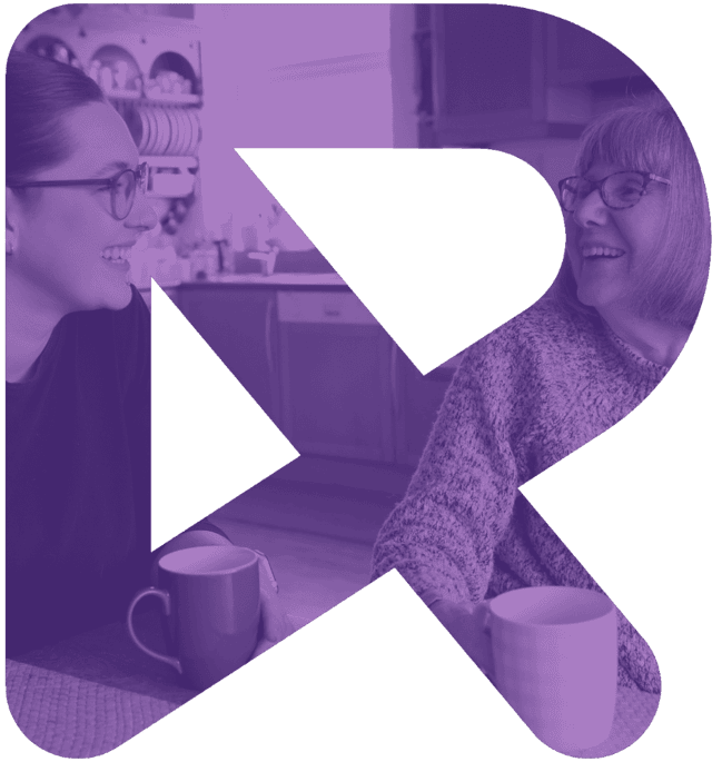 Care worker helping elderly resident in Saddleworth home